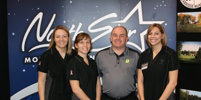 Lloyd Young At A Golf Show With His Lovely Crew